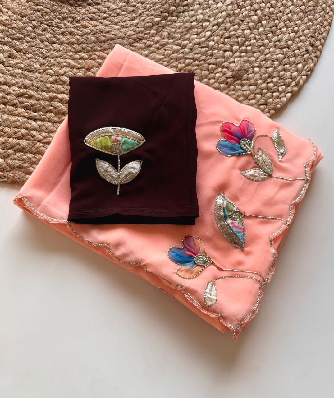 Soft Georgette Fabric With Beautiful Floral Patch Work And Embossed Cutwork Border Saree