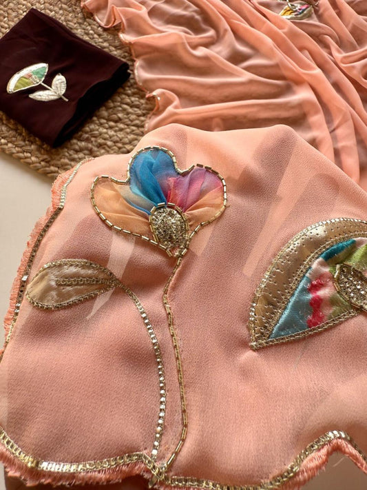 Soft Georgette Fabric With Beautiful Floral Patch Work And Embossed Cutwork Border Saree