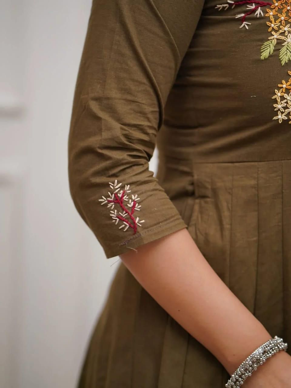 Earthy olive and black with delicate embroidery is elegance redefined Kurta