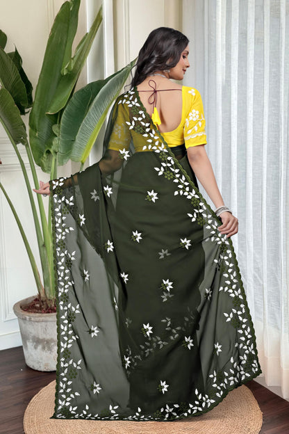 Georgette with floral design embroidery with scalloped cutwork border Saree