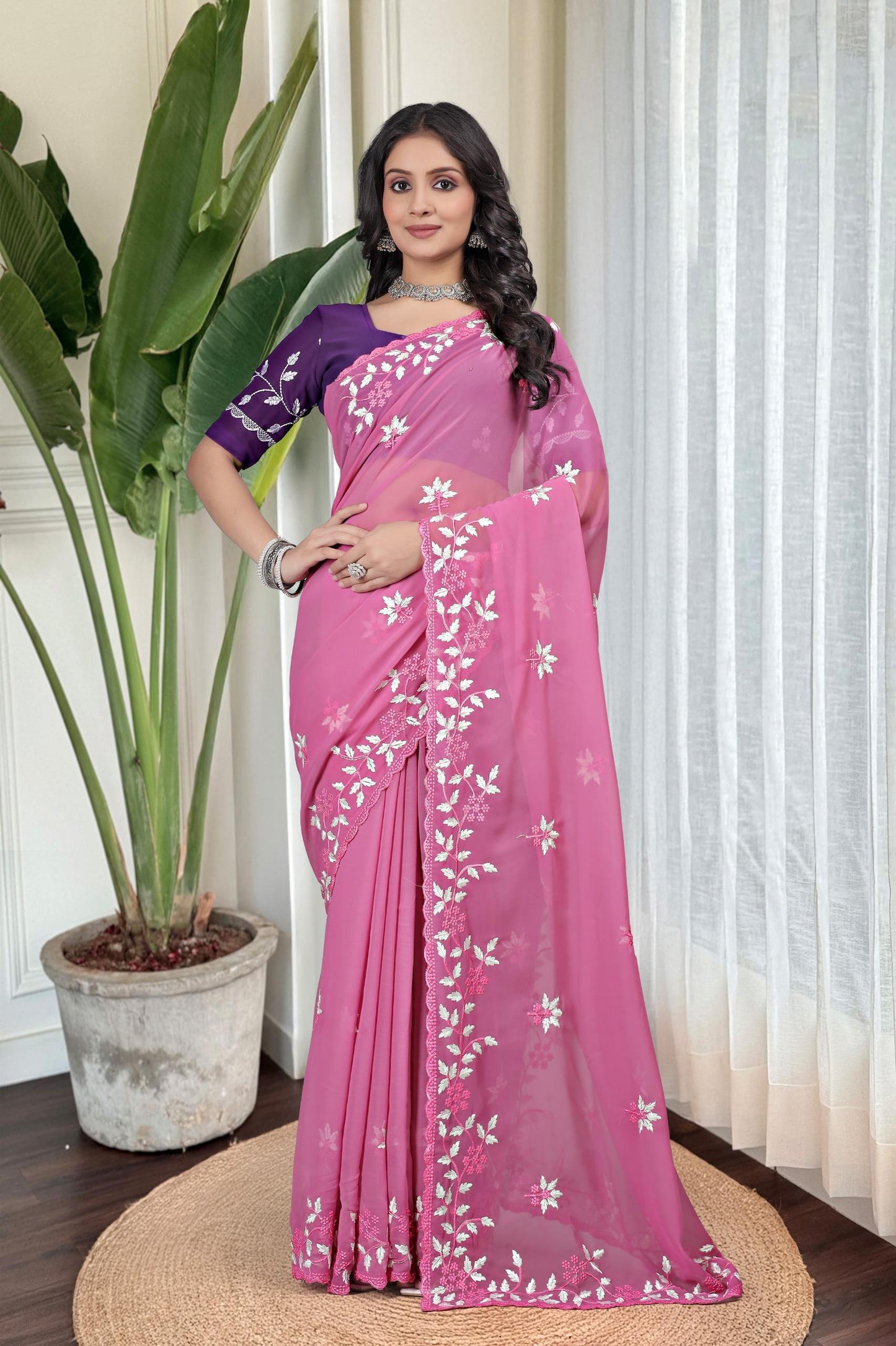 Georgette with floral design embroidery with scalloped cutwork border Saree