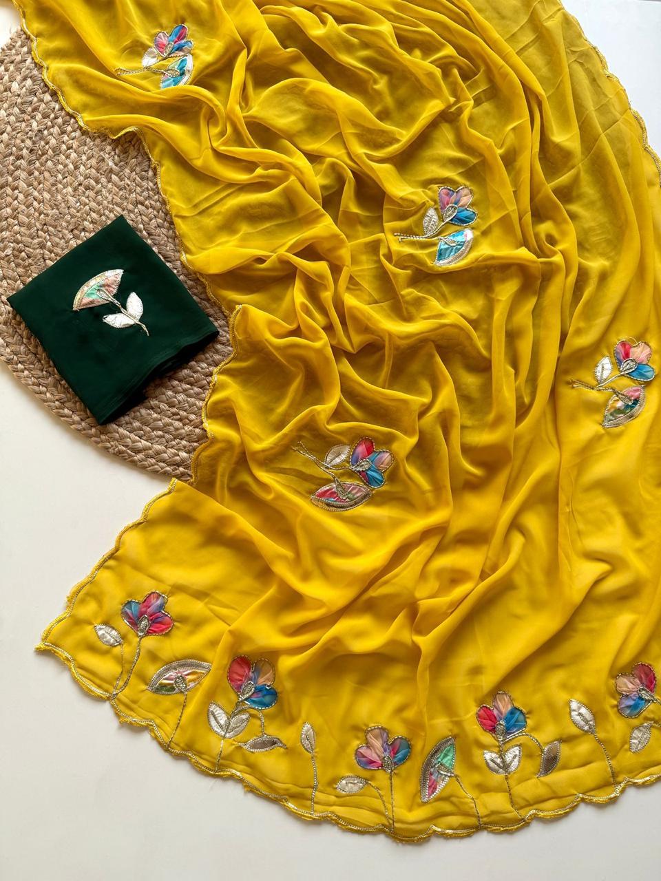 Soft Georgette Fabric With Beautiful Floral Patch Work And Embossed Cutwork Border Saree