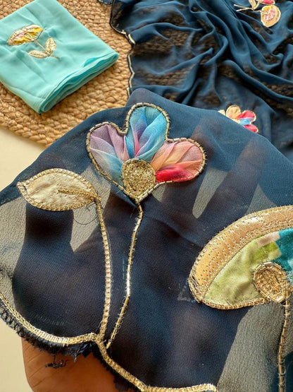 Soft Georgette Fabric With Beautiful Floral Patch Work And Embossed Cutwork Border Saree