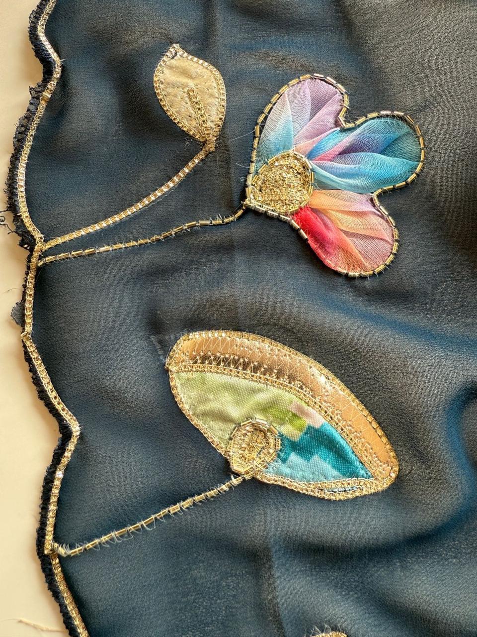 Soft Georgette Fabric With Beautiful Floral Patch Work And Embossed Cutwork Border Saree