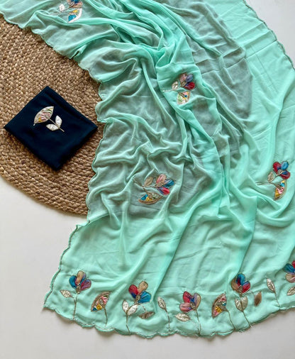 Soft Georgette Fabric With Beautiful Floral Patch Work And Embossed Cutwork Border Saree