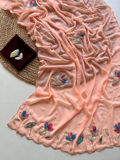 Soft Georgette Fabric With Beautiful Floral Patch Work And Embossed Cutwork Border Saree