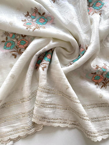 Crunchy ciffon saree with elegant scalap and thread embroidery work.