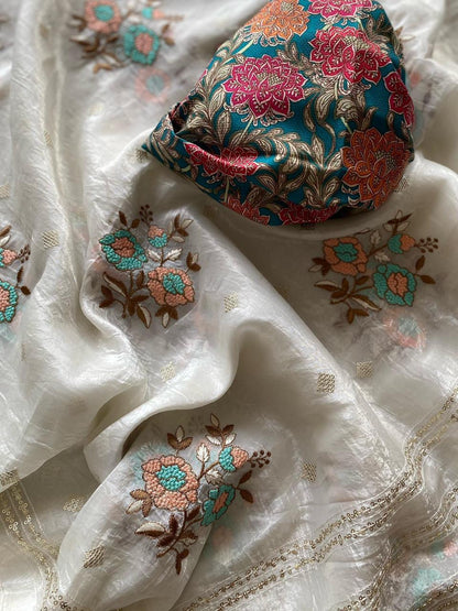 Crunchy ciffon saree with elegant scalap and thread embroidery work.