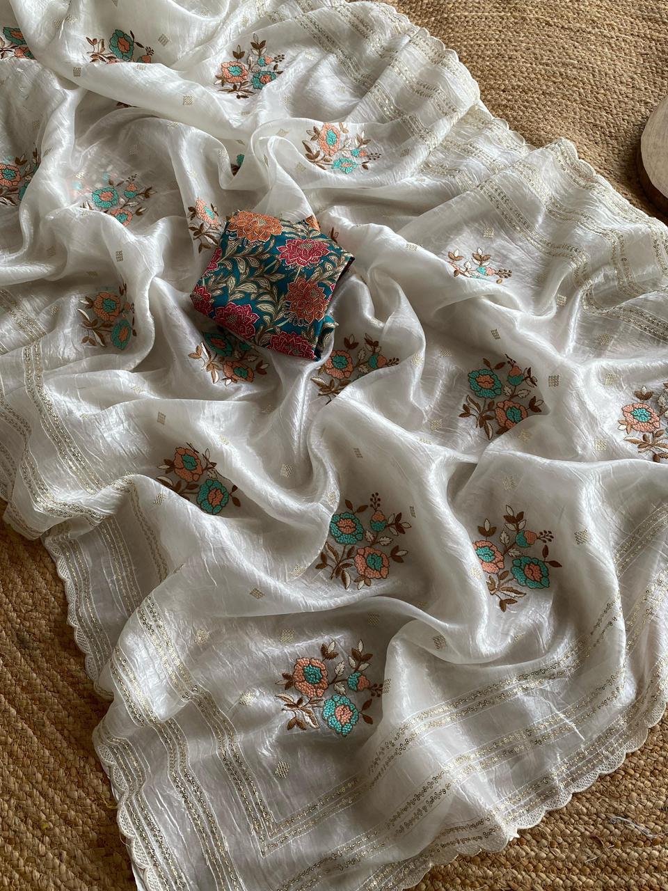 Crunchy ciffon saree with elegant scalap and thread embroidery work.