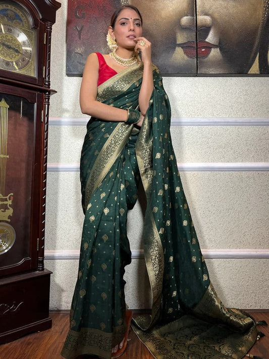 Silk Saree from the adorned with beautiful Zari work in form of traditional motifs