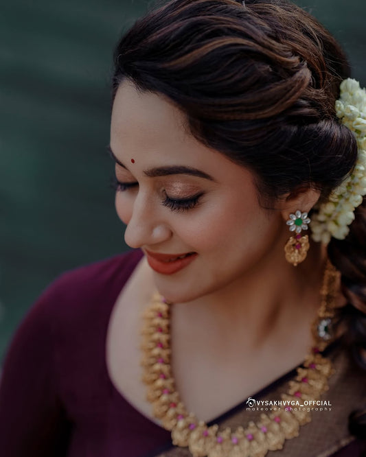 Silk Saree from the this store is adorned with beautiful Zari work