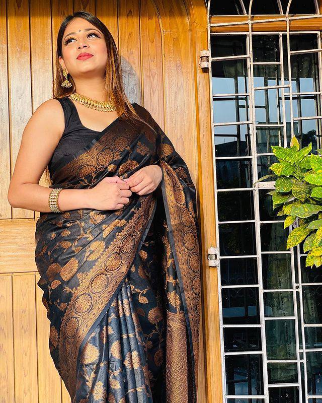 Silk Saree from the this store is adorned with beautiful Zari work